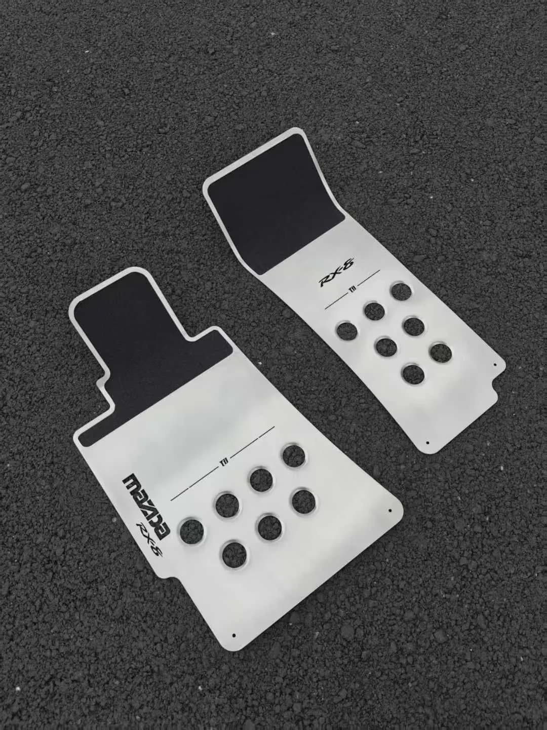 Actual compact perforated and ribbed custom floor panel pair