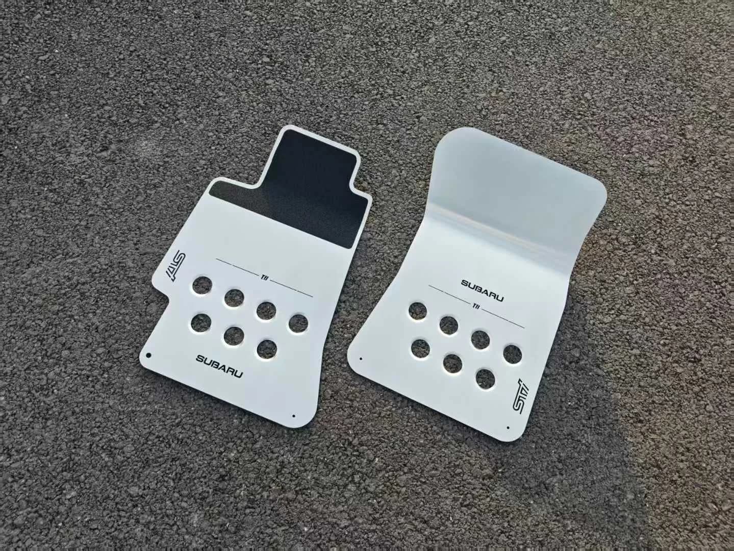 Actual compact ribbed metal floor mat pair